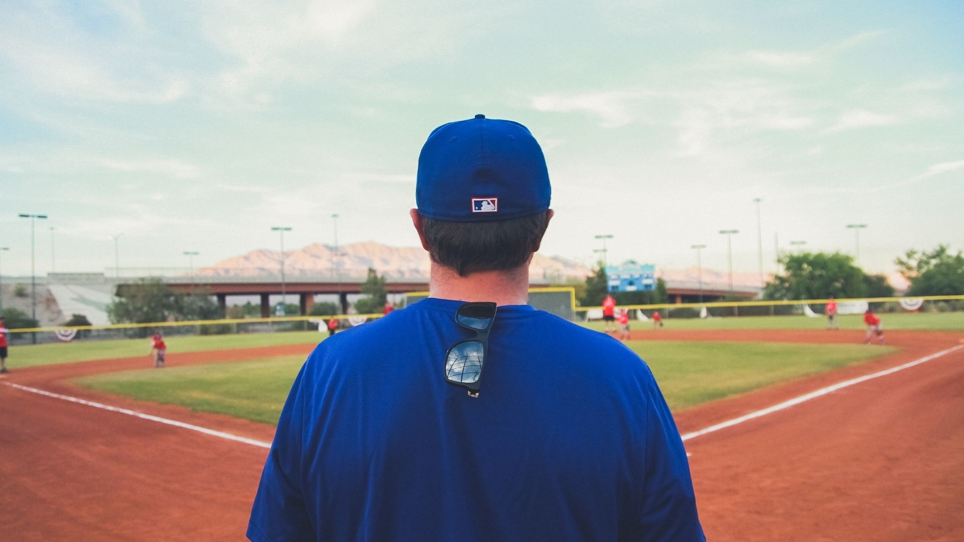 Baseball coach looking at the field